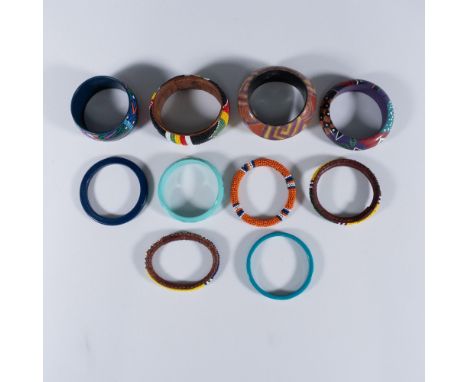 This colorful collection features a variety of bangle in highly detailed Global design designs. The largest piece measures ap