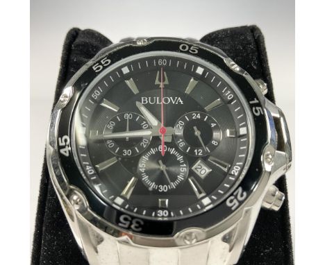 Massive stainless steel Bulova Classic Sport gentleman watch featuring a round black dial with luminous silver-tone hands and