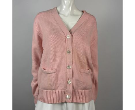 Cotton V neck, 5 button front sweater with front pockets. Heavy knit wrist cuffs and border. RLL monogram on front. Lauren Ra
