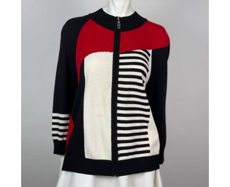 Exquisite knit geo print sweater sporting black, red, and white colors. St John tag on neck and stamp on zipper. 66 percent w
