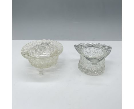 Stunning duo of ashtrays that consists of a Daisy and Button Kettle designed three footed ash tray, and a seashell shaped rim