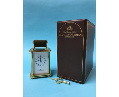 A boxed Matthew Norman carriage clock