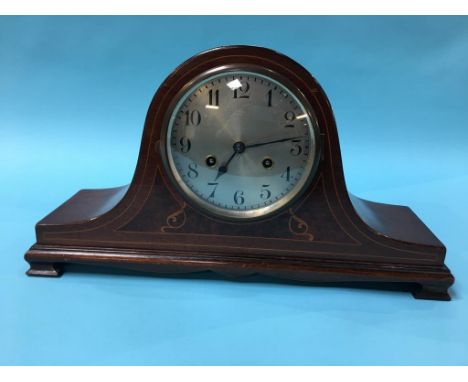 A mahogany mantle clock