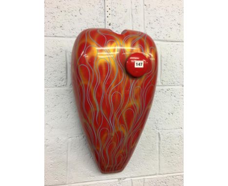 A pin striped Harley Davidson petrol tank