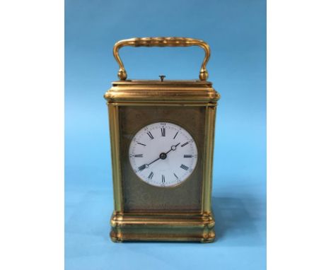 A brass carriage clock with strike action.