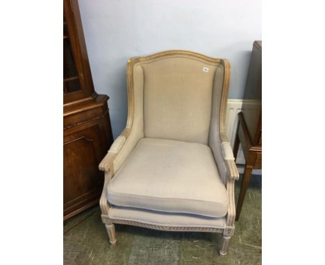 A light grey armchair