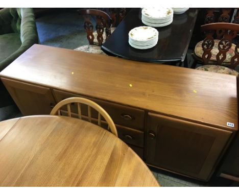 An Ercol Golden Dawn sideboard