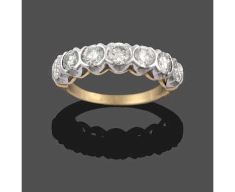 A Diamond Seven Stone Ring, the round brilliant cut diamonds in broad white claw settings, to a yellow plain polished shank, 