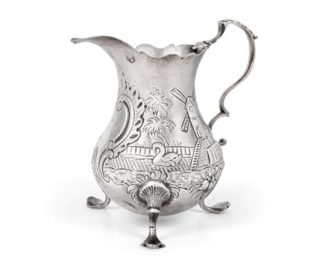 A George III Silver Cream-Jug, Maker's Mark AS NS, London, 1768, pear-shaped and on pad feet, one side chased with a cow with