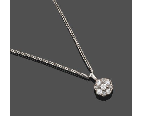 A Diamond Cluster Pendant on Chain, the central round brilliant cut diamond in a white claw setting within a border of round 