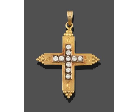 A Diamond Cross Pendant, the cross motif set throughout with round brilliant cut diamonds in white claw and channel settings,