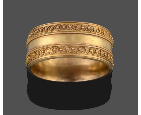 A Hinged Victorian Bangle, with rope twist and beaded detail throughout, measures 5.6cm by 5.1cm see illustration .  The bang