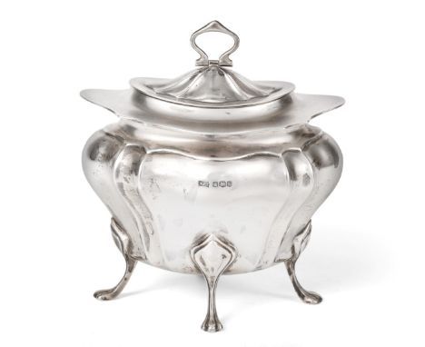 A George V Silver Tea-Caddy, by Walker and Hall, Sheffield, 1919, fluted oval section and on four paw feet, the pull-off cove