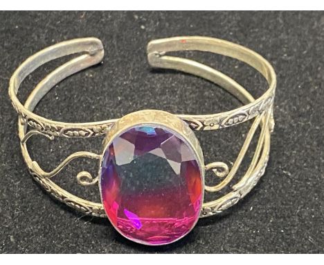 A 925 silver bangle with large glass stone 