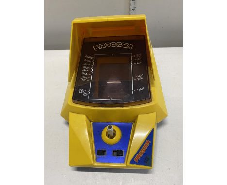 A vintage Frogger electronic table top game. (untested) 