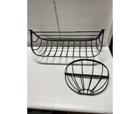 Two vintage cast iron feeders/planters. No shipping 