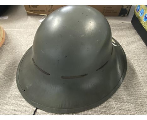 A WW2 Civil Defence British helmet 