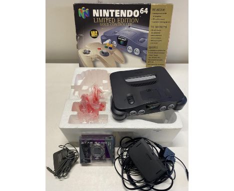 A Nintendo Limited edition console with accessories (missing the golden controller) 