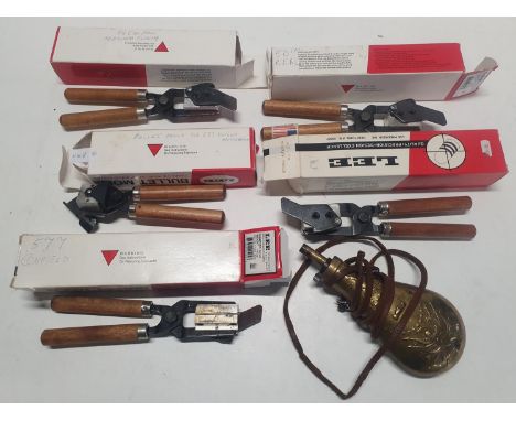 A selection of assorted calibre Lee bullet moulds and a reproduction American Civil War period powder flask 