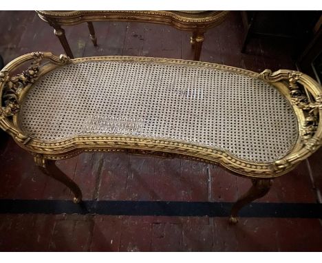 A late 19th century French wooden &amp; gilt framed window seat with cane work seat (with repair).  No shipping 