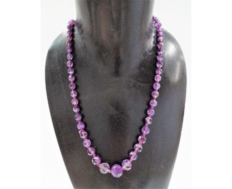 Amethyst faceted graduated bead necklace, length 52cm; together with a 9ct amethyst diamond chip ring, weight 2.3g approx.
