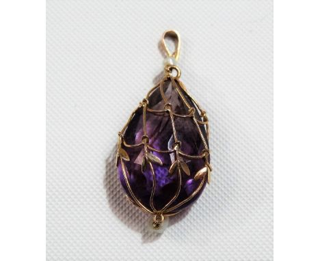 A 9ct gold and amethyst pendant with seed pearl drop, length 40mm approx.