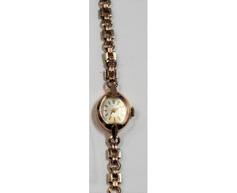 9ct gold ladies Tudor Royal manual wind wristwatch with 9ct gold bracelet, the silvered dial with baton markers, the seventee
