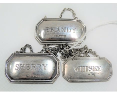 George III silver decanter label, maker M &amp; R, Edinburgh 1817; together with two other silver hallmarked decanter labels,