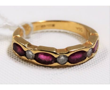 Contemporary 18ct gold diamond &amp; ruby seven stone ring, the two diamonds of 0.05ct spread approx, weight 3.9g approx
