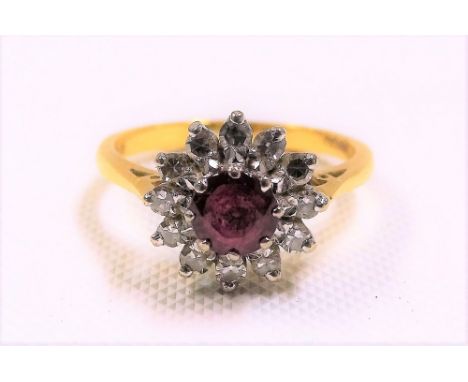 18ct gold diamond &amp; ruby cluster ring, the ruby of 0.50ct spread approx, weight 3.9g approx
