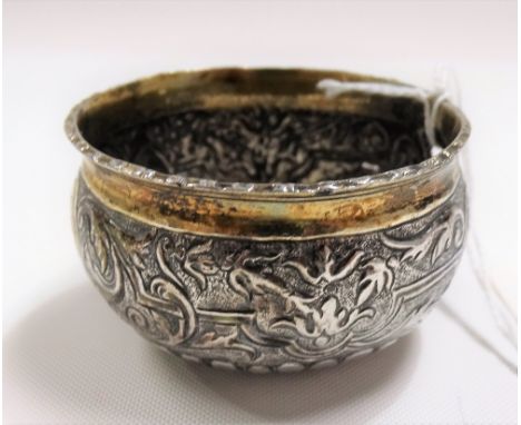 Silver toddy ladle bowl with foliate strapwork embossed decoration &amp; inset with a Queen Anne shilling, weight 29g approx