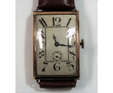 1920's Art Deco 9ct gold cased gentleman's manual-wind wristwatch, the 22mm rectangular silvered dial with stylised Arabic Nu