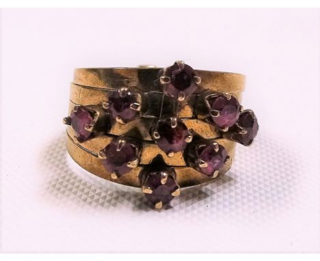 14ct gold ruby set five section ring, stamped 14k, weight 4.7g approx.