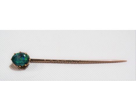 Gold blue opal stick pin, the oval blue, green &amp; orange flash opal of 1ct spread approx, weight 1.4g approx