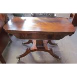A Regency mahogany card table with a rectangular fold over top with a baize interior on a tapering