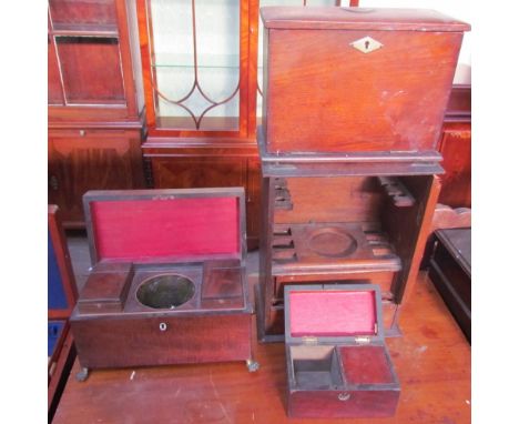 A 19th century mahogany tea caddy with two divisions on lions paw feet together with an oak stationery box, a smokers cabinet