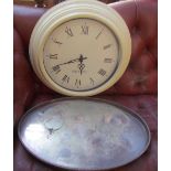 An electroplated gallery tray together with a wall clock