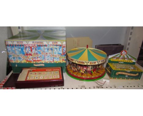 A Corgi “The South Down Gallopers carousel, CC20401 together with a Garrett Showman's tractor and a mahjong set