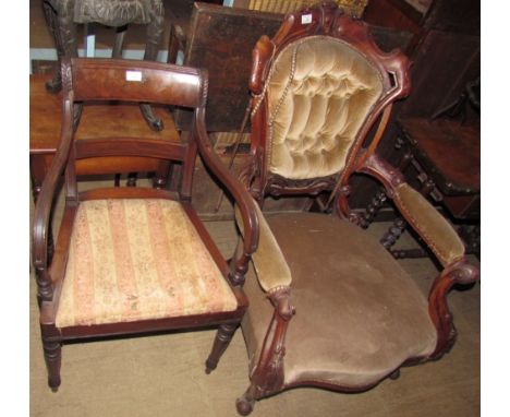 A Victorian walnut framed library chair with a button back upholstered back, arms and seat on scrolling legs together with a 