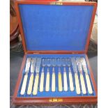 A cased set of fish knives and forks