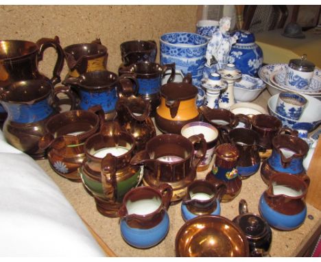 Assorted copper lustre jugs together with blue and white pottery, truncheon, theatre programmes, first day covers, tennis rac