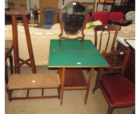 A 20th century card table tea trolley together with a 19th century shield shaped toilet mirror, bentwood chair, nursing chair