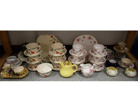 Teaware - a Colclough tea service, printed with roses; a Staffordshire Art Deco tea service; a Belleek Shamrock pattern cream