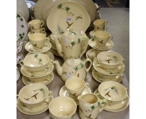 Ceramics - a Royal Doulton The Coppice pattern part dinner, tea and coffee service, including teapot, coffee pot, dinner plat