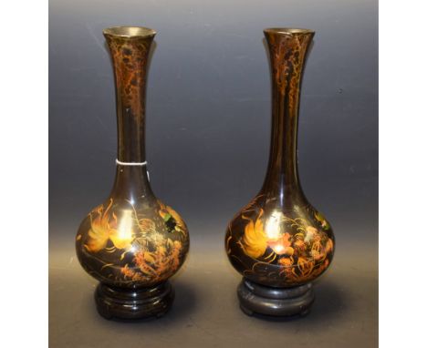 A pair of lacquered vases, decorated with exotic fish and coral, 30cm high (2)