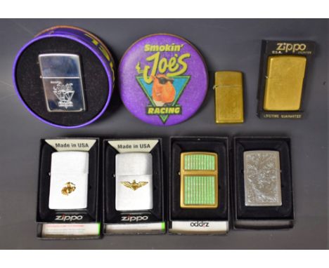 Tobacciana - a Zippo lighter, Smokin' Joe's Racing lighter, in circular tin, sealed; a Venetian swirl lighter, brass; two oth