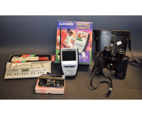 A Casio VL-Tone 10 electronic keyboard and calculator, carrying pouch and box; a Casio EV-660 portable colour TV; a pair of b