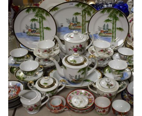 Oriental Ceramics - a Japanese dinner and tea service, decorated with a stylised scene; another, rose pattern, etc