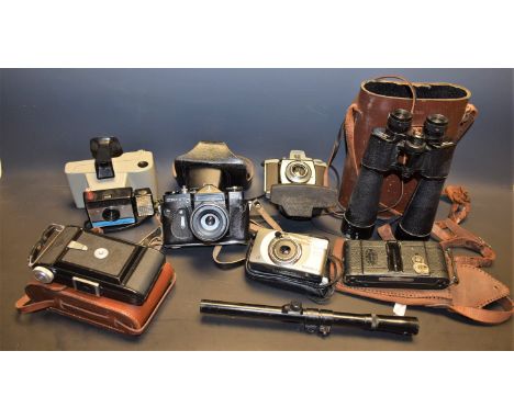 Cameras - Zenit; Polaroid, Liebarman and Gortz 25x52 binoculars; Nikko Stirling 4x15 sight, etc