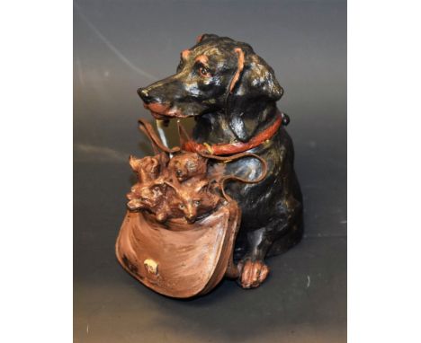 A painted bronze coloured metal inkwell, as a dog with puppies, 11cm high